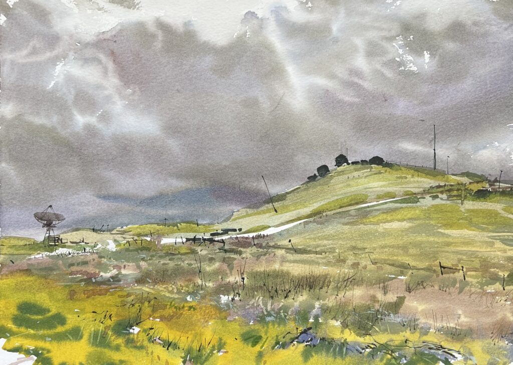 Watercolour landscape with a grey cloudy sky and green rolling hills