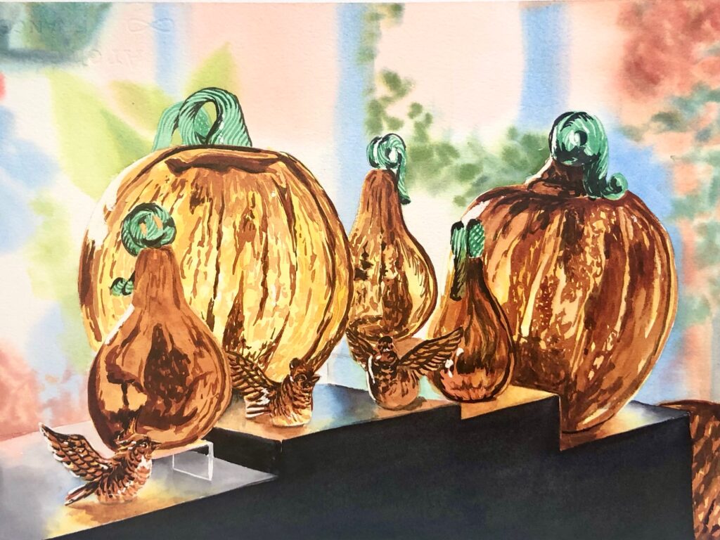 watercolour painting of clear orange glass pumpkin shaped ornaments gleaming in sunshine